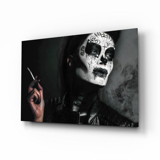 Women's glass wall art displayed above a console in a designer interior