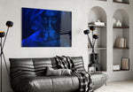Smoke and Woman glass wall art styled in a moody lounge
