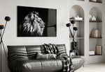 Lion glass wall art styled above a sofa in a leader's living room