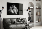 Lion glass wall art styled above a sofa in a leader's living room