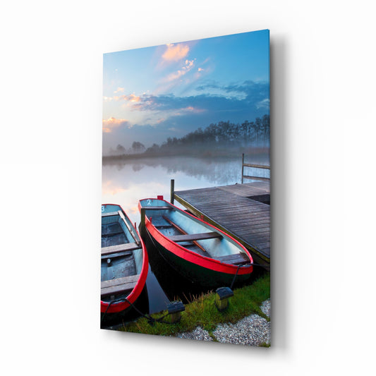Lake and Boats Landscape glass wall art displayed above a console in a designer interior