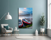 Lake and Boats glass wall art styled above a bed in a lake-house bedroom