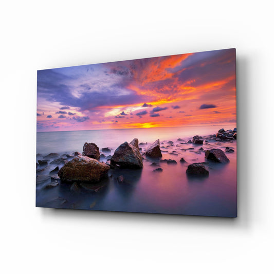 Sunset at Sea glass wall art displayed above a console in a designer interior