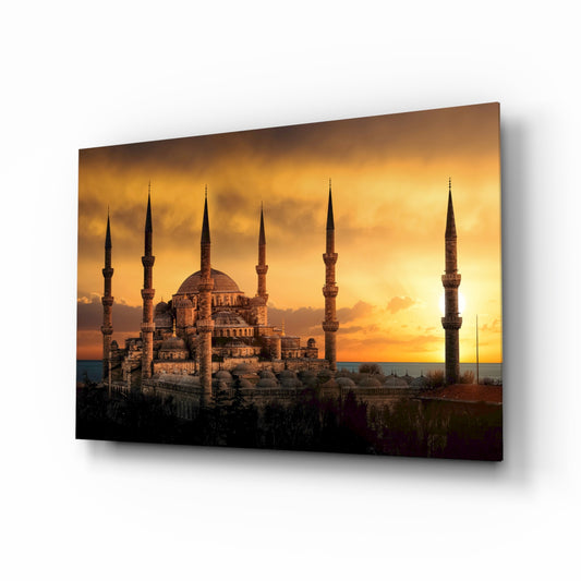 Blue Mosque glass wall art displayed above a console in a designer interior