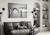 Dock glass wall art styled above a desk in a contemplative study