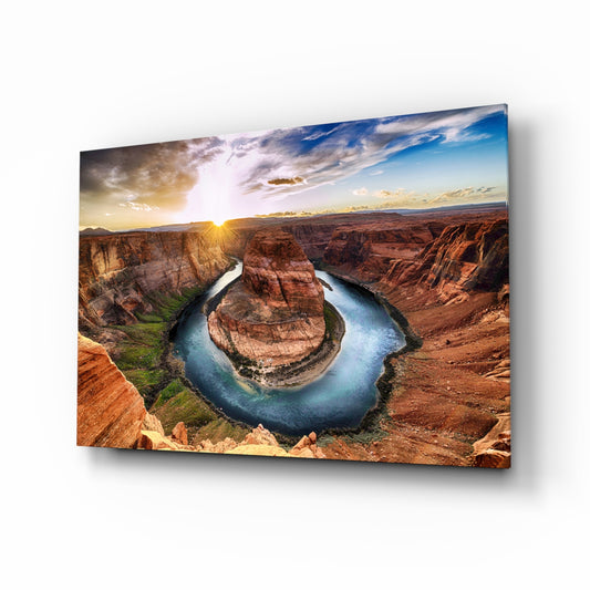 Canyon glass wall art displayed above a console in a designer interior