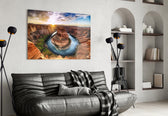 Canyon glass wall art styled above a sofa in an adventure-themed living room