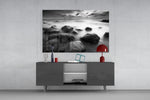 Cliffs panel catching soft light to reveal its ghostly water drift