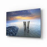Sea Landscape glass wall art displayed above a console in a designer interior