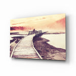 Dock in the Fog glass wall art displayed above a console in a designer interior