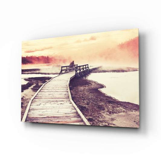 Dock in the Fog glass wall art displayed above a console in a designer interior