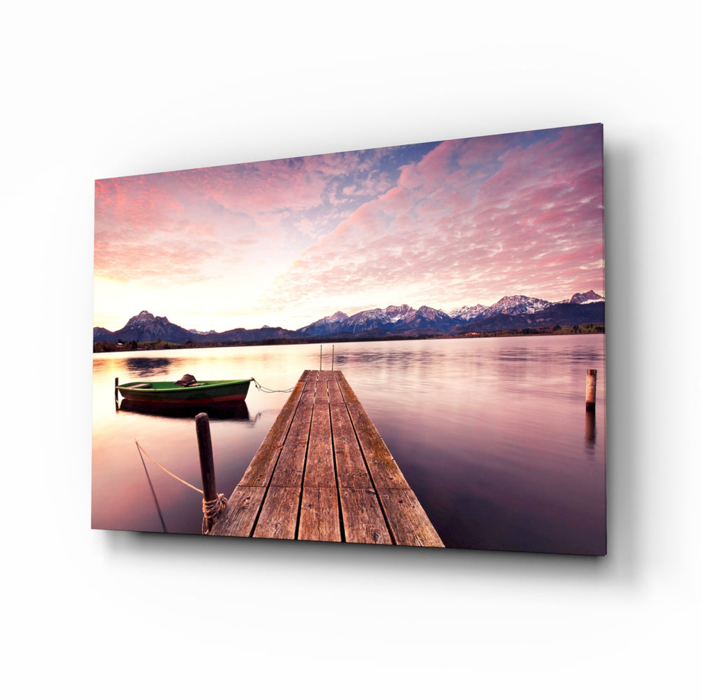 Sunset on the Beach glass wall art displayed above a console in a designer interior