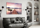 Sunset on the Beach glass wall art styled above a sofa in a romantic living room