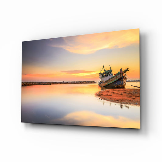 Ship On The Beach glass wall art displayed above a console in a designer interior