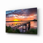 Sunset on the Beach glass wall art displayed above a console in a designer interior