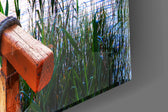 Dock artwork anchoring a lakeside-themed wall in pastel palette