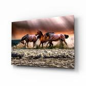 Horses glass wall art displayed above a console in a designer interior