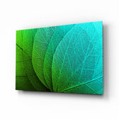 Green Leaf glass wall art displayed above a console in a designer interior