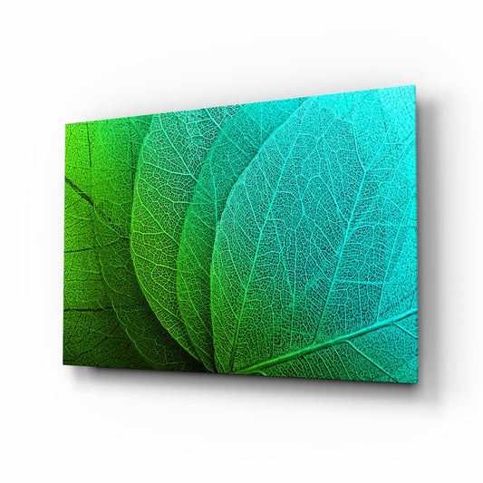 Green Leaf glass wall art displayed above a console in a designer interior