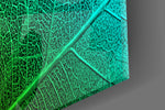 Green Leaf artwork anchoring a biophilic-themed wall in jewel-tone palette