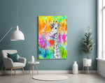 Giraffe glass wall art styled in a child's safari-theme room