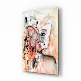 Abstract Woman glass wall art displayed above a console in a designer interior