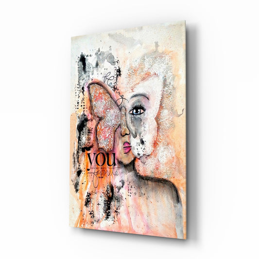 Abstract Woman glass wall art displayed above a console in a designer interior