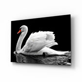 Swan glass wall art displayed above a console in a designer interior
