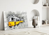 Close-up detail of two yellow trams on a graphite cross-hatched street
