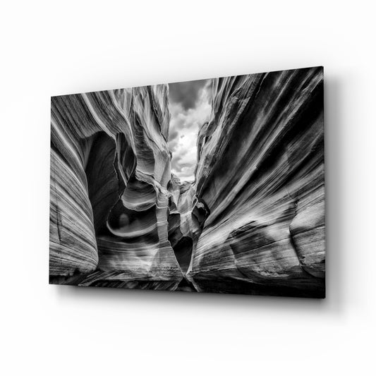 Grand Canyon glass wall art displayed above a console in a designer interior