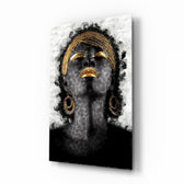 African Woman Portrait glass wall art displayed above a console in a designer interior