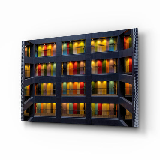 Colored Doors glass wall art displayed above a console in a designer interior