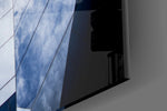 Geometric Architecture artwork anchoring a contemporary wall in moody palette
