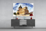 Historical Building panel catching daylight to reveal its watercolor sky