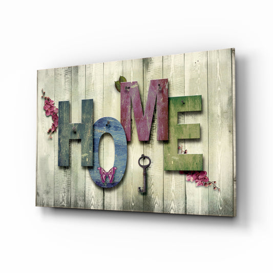 Home glass wall art displayed above a console in a designer interior