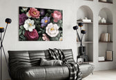 Floral glass wall art styled above a sideboard in a dining room