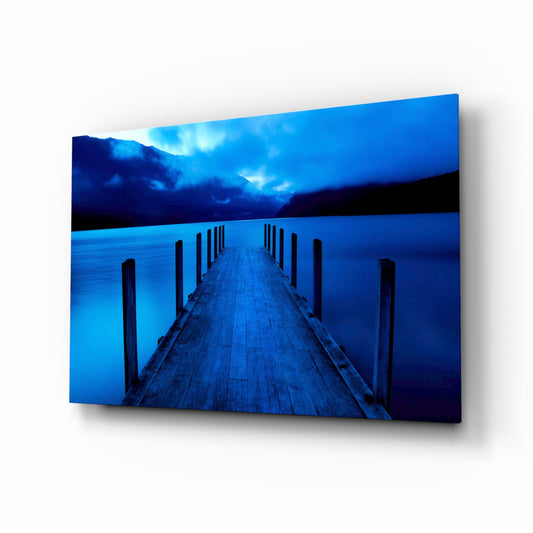 Dock glass wall art displayed above a console in a designer interior