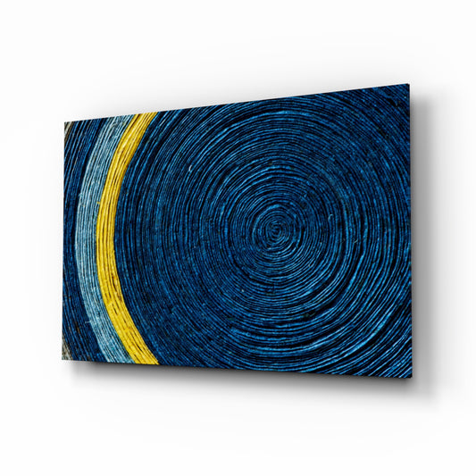Colored Spiral glass wall art displayed above a console in a designer interior