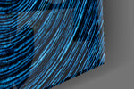 Colored Spiral artwork anchoring a contemporary wall in moody palette