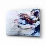Smoke glass wall art displayed above a console in a designer interior