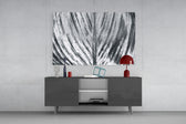 Leaf panel catching soft light to reveal its luminous spine