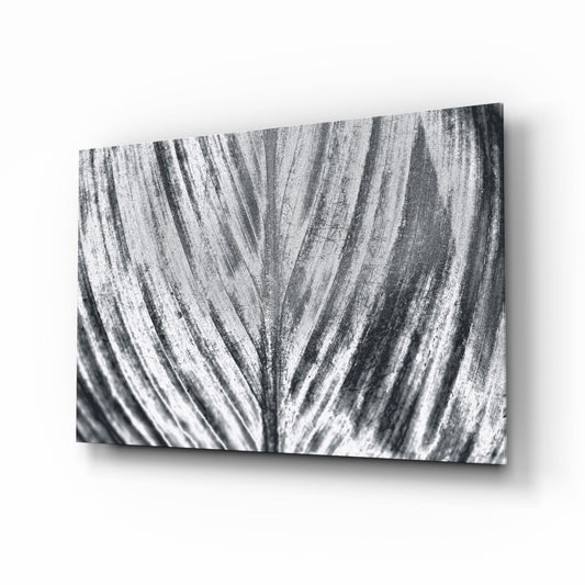 Leaf glass wall art displayed above a console in a designer interior