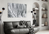Leaf glass wall art styled above a desk in a botanical study