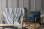 Leaf glass print enhancing a hallway with quiet drama