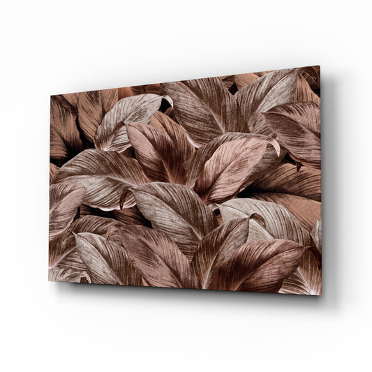 Tropical Leaf glass wall art displayed above a console in a designer interior
