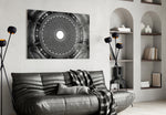 Dome glass wall art styled above a desk in an architectural-focus study