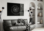 Spiral Stairs glass wall art styled above a desk in an architectural-focus study