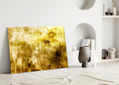 Close-up detail of distressed gold-and-honey brushwork meeting tobacco shadow