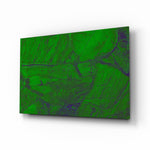 Green Abstract Pattern glass wall art displayed above a console in a designer interior