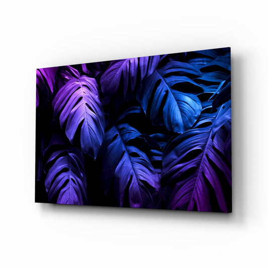 Tropical Leaf glass wall art displayed above a console in a designer interior
